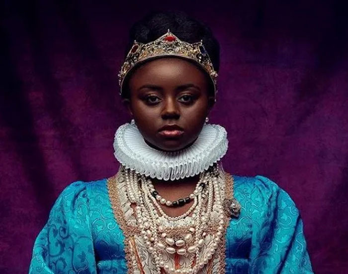 woman in medieval queen costume